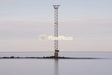 Isolated Navigation Tower in Calm Seascape